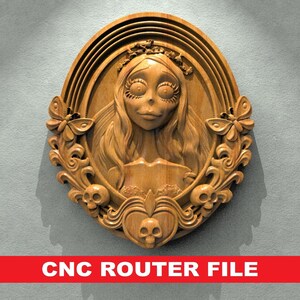 May include: Wooden CNC router file featuring a carved portrait of a character with long hair, a floral crown, and large eyes. The design includes butterflies, skulls, and the text "CNC ROUTER FILE" in a red banner.