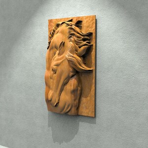 May include: A wooden wall sculpture of a horse's head, carved in a realistic style. The horse's mane is flowing in the wind, and its eyes are closed. The sculpture is painted in a natural wood tone.