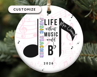 May include: A white, round ornament with a musical theme. It features a large black musical note, musical staff, and the text "Life without music would Bb". The ornament also includes the text "Music Teacher" and "Mrs. Cloud", with the year "2026".