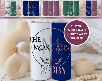 May include: A rustic wooden sign with the text "Welcome to our home" in white lettering. The sign features a distressed finish and a simple, inviting design, perfect for front door decor.