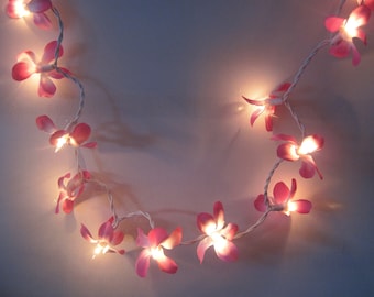 Floral fairy lights Frangipani pink purple 20 lights 3 m long handmade for indoor use