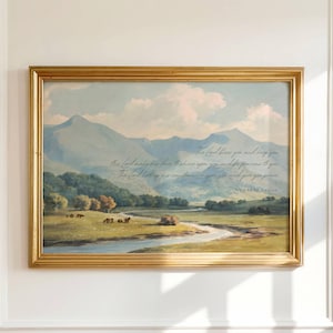 A printable wall art listing with a vintage oil painting in blues, greens, and yellows with a mountainous blue landscape, green trees, and a river running through a meadow with the bible verse from Numbers 6:24-26: "The Lord bless you and keep you; the Lord make his face to shine upon you and be gracious to you; the Lord lift up his countenance upon you and give you peace" written in script over the landscape. The scripture makes this subtle Christian art.