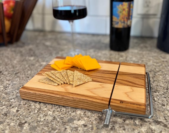 Maple and Oak Cheese Slicer and serving board.