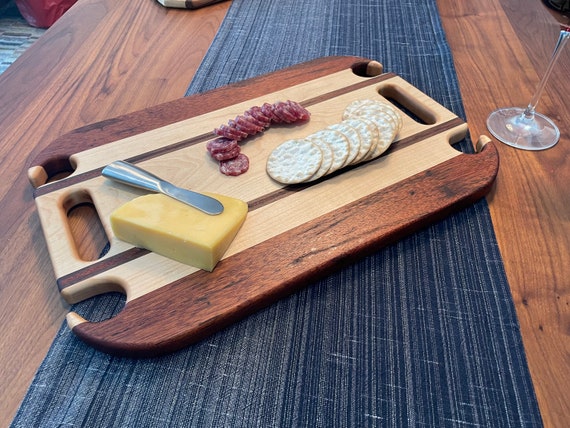 Personalized Charcuterie Board made from Hard Maple, Mahogany and Walnut.
