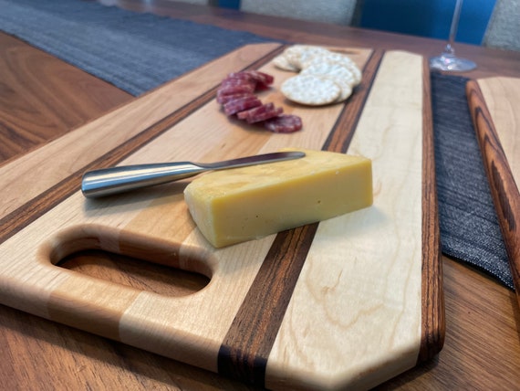 Personalized Charcuterie Board featuring Maple with Walnut & Zebrawood.