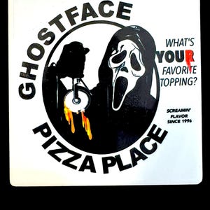 May include: Square white sticker with a black and white graphic of the Ghostface mask from the Scream movies. The text reads "GHOSTFACE PIZZA PLACE" and "WHAT'S YOUR FAVORITE TOPPING?" with "SCREAMIN' FLAVOR SINCE 1996".