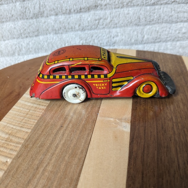 Vintage 1930 Marx Tin Wind Up Toy with Key. Tricky Taxi