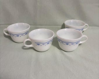 Pyrex “morning blue flower” coffee cups. Set of four.