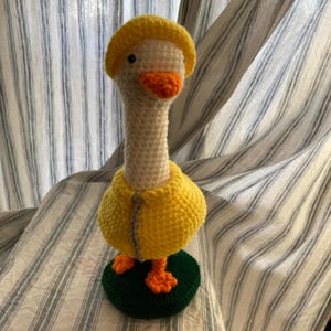 Crocheted Desk Goose – Handmade Amigurumi with Raincoat