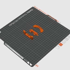 Puede incluir: Piezas impresas en 3D de color naranja para un mando Razor Wolverine V2. Las piezas están sobre una superficie negra texturizada con un patrón de cuadrícula. El texto "Razor Wolverine V2 Controller Bite" es visible en la esquina superior derecha de la imagen.