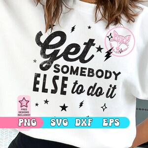 May include: White t-shirt with black text that reads "Get Somebody Else to do it" with stars and lightning bolts around the text.