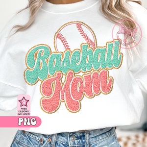 May include: A white t-shirt with a graphic design of a baseball and the text "Baseball Mom" in pink and green with gold glitter accents.