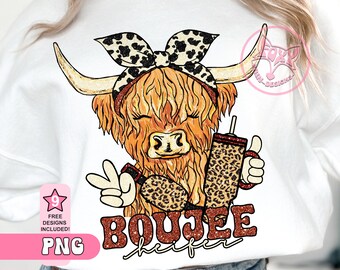 May include: A digital illustration of a Highland cow wearing a leopard print headband and holding a leopard print tumbler. The cow is wearing a peace sign ring and has a sassy expression. The text "BOUJEE heifer" is written below the cow in a glittery font.
