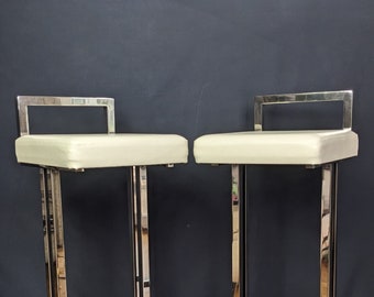 Pair of iconic 1970s chrome bar stools attributed to Italian designer and metalworker extraordinaire Romeo Rega