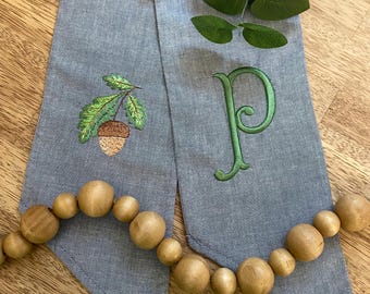 Faja de corona bordada con bellota y monograma, personalizada