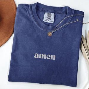 Cute embroidered Christian shirt with Amen embroidery on a true navy shirt