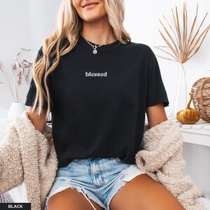 Clean and minimalist faith shirt in black