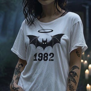 Ozzy Osbourne Bat Tshirt 1982 Tribute Shirt Classic Rock And Roll Band Tee Vintage Heavy Metal Shirt Gift For Men And Women