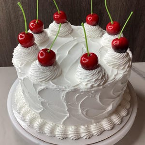 Cherries on top large fake cake