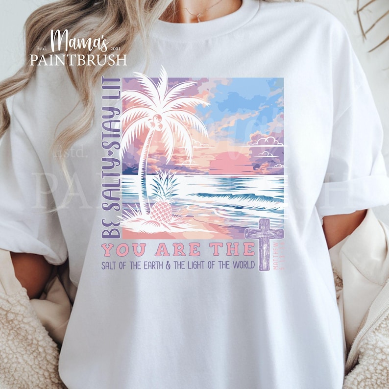 This “Be Salty, Stay Lit” Christian PNG design inspired by Matthew 5:13–16 features a peaceful tropical sunset, palm trees, ocean waves, and a cross—symbolizing faith, light, and God’s calling for believers to shine in the world. With its soft pastel coastal colors and uplifting Bible verse message, this digital download is perfect for creating faith-based apparel, gifts, and home décor.