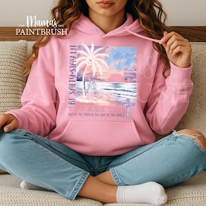 This “Be Salty, Stay Lit” Christian PNG design inspired by Matthew 5:13–16 features a peaceful tropical sunset, palm trees, ocean waves, and a cross—symbolizing faith, light, and God’s calling for believers to shine in the world. With its soft pastel coastal colors and uplifting Bible verse message, this digital download is perfect for creating faith-based apparel, gifts, and home décor.