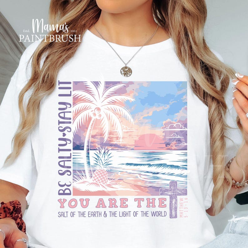 This “Be Salty, Stay Lit” Christian PNG design inspired by Matthew 5:13–16 features a peaceful tropical sunset, palm trees, ocean waves, and a cross—symbolizing faith, light, and God’s calling for believers to shine in the world. With its soft pastel coastal colors and uplifting Bible verse message, this digital download is perfect for creating faith-based apparel, gifts, and home décor.