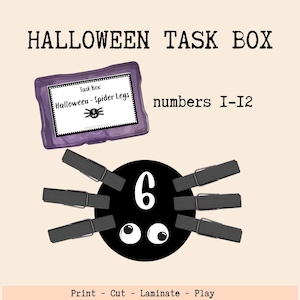 May include: A Halloween task box set featuring a purple plastic container with a label reading Task Box: Halloween - Spider Legs, and a black circular spider cutout with the number 6 and six black clothespins attached as legs.