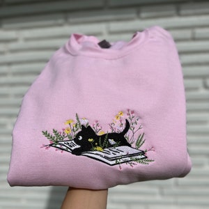 Cute Cat Lying On Book With Flower Embroidered Sweatshirt, Book Lover Tshirt, Flower With Cat Embroidered Sweatshirt, Comfort Colors Shirt