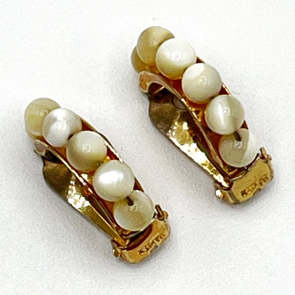 Napier Pat Pend Arc Shaped Gold Toned Pearly Stones Clip Earrings