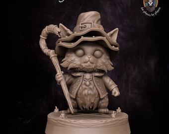May include: A miniature figurine of a cat wearing a wizard hat and holding a staff. The cat is brown and has a white collar. The figurine is standing on a round base.