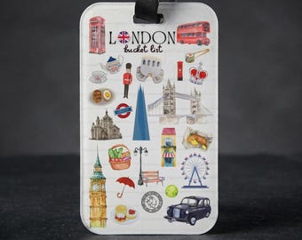 Etiqueta para equipaje con temática londinense: accesorio de viaje de acrílico con correa de cuero.