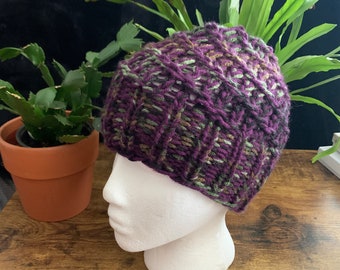 Homemade knit beanie hat. Purple and camo yarn. Bonus hat donated to charity with every hat sold!