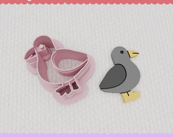 May include: Two 3D printed cookie cutters in the shape of a bird. The cutter on the left is pink and the cutter on the right is gray. The text "6 Sizes - Polymer Clay Cutters" is at the bottom of the image.
