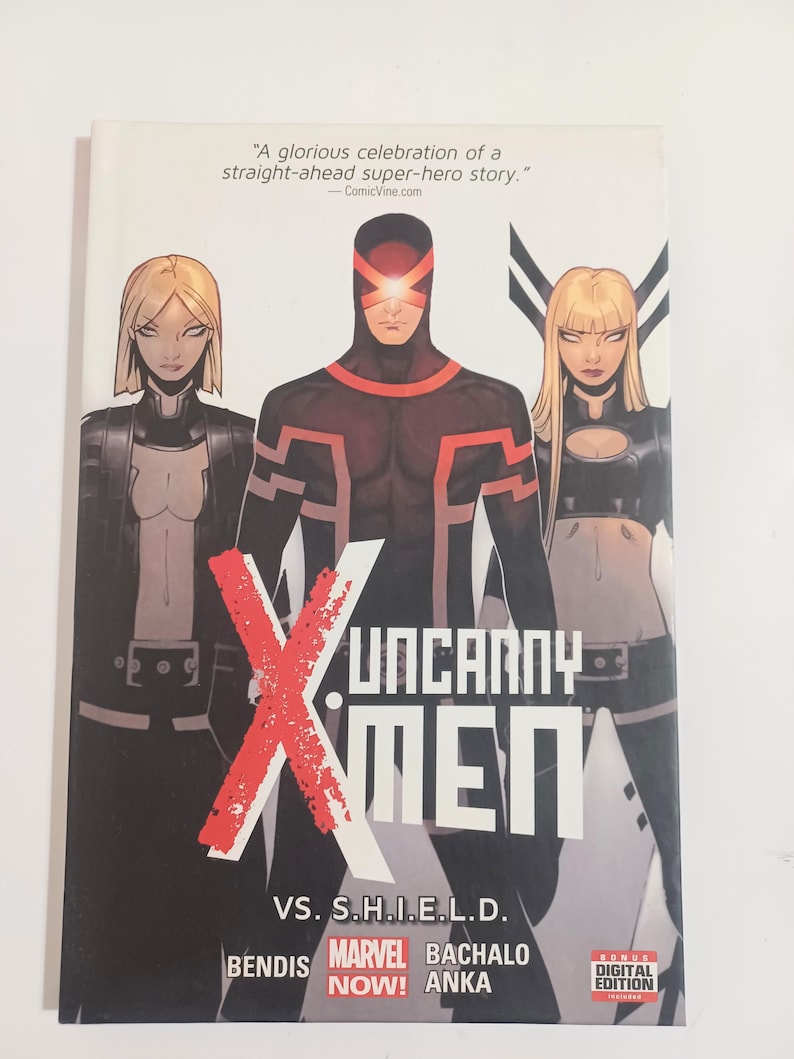 May include: A comic book cover for "Uncanny X-Men" features three costumed characters. The central figure is in a dark red and black suit with a visor. The title is in large white letters with a red "X" overlay. The cover includes text: "VS. S.H.I.E.L.D."