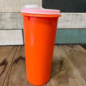 Vintage Tupperware 262-4 orange beverage container with pour spout lid