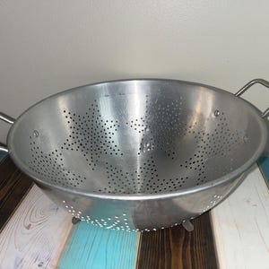 Vintage 1950’s 11" aluminum strainer Stars Colander footed with handles