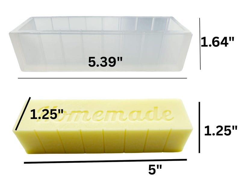 May include: A clear, rectangular soap mould, 13.69 cm long and 4.17 cm high, sits above a yellow soap bar. The bar is 12.7 cm long, 3.18 cm high, and has "homemade" embossed on top. Soap making supplies.