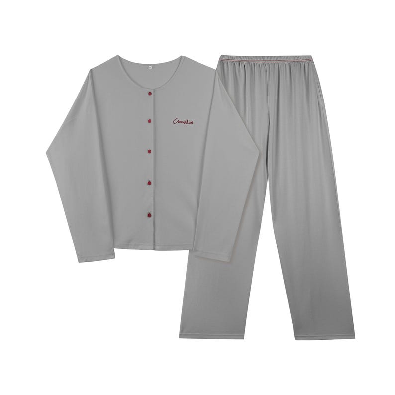 May include: Gray long-sleeved pajama top with button closure and "Cherish" embroidered on the front, paired with matching gray long pants.
