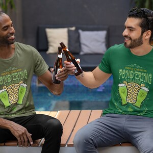 Sipping Guinness, Pondering Galaxies. Happy St. Patrick's day. The Perfect Unisex T-Shirt for the Irish Astrophysics Lover.