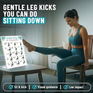 May include: A woman in teal activewear demonstrates a leg kick while seated. A white framed chart on a table displays chair yoga poses. The chart is titled "CHAIR YOGA for Weight Loss". The text "GENTLE LEG KICKS YOU CAN DO SITTING DOWN" is at the top.