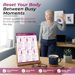 May include: A wooden stand holds a printed guide titled "Complete Tai Chi Walking Program for Seniors." The guide displays illustrated Tai Chi poses. Text above reads "Reset Your Body Between Busy Moments." A woman waves in the background. A mug of tea and a small plant are on the desk.