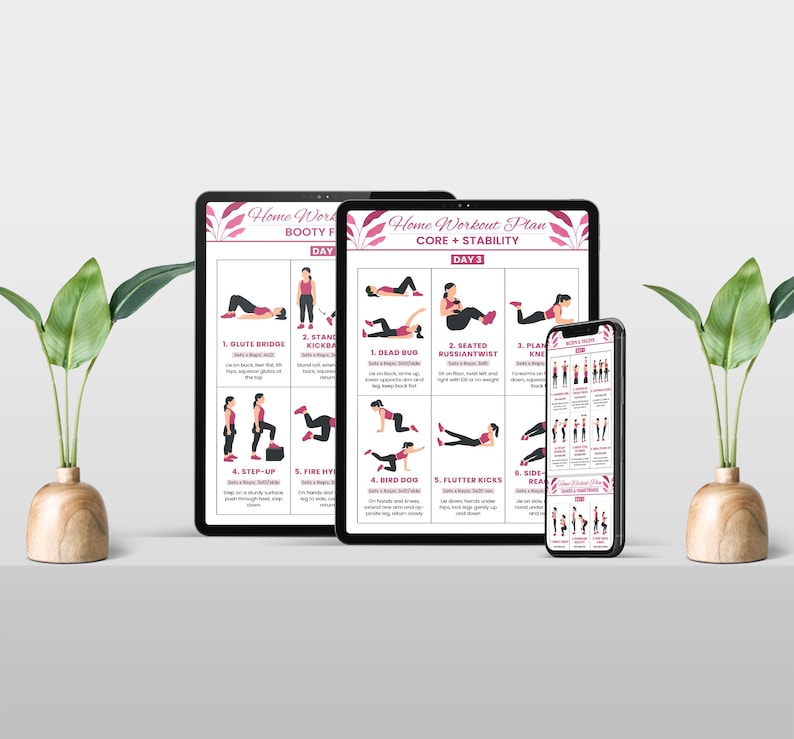 May include: A home workout plan displayed on a tablet, a larger tablet, and a smartphone. The plan is divided into sections for Booty and Core + Stability, with exercise illustrations and instructions. The devices are on a white surface, with decorative plants on either side.