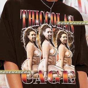Thiccolas Cage Nicolas Cage Meme Tee – Thicc Graphic T-Shirt – Pop Culture Humor Gift – Unisex Comedy Shirt