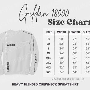 May include: A Gildan 18000 size chart for a heavy blended crewneck sweatshirt. The graphic displays a light gray sweatshirt outline with dashed lines indicating width, length, and sleeve measurements, alongside a table listing sizes S to 5XL in inches.