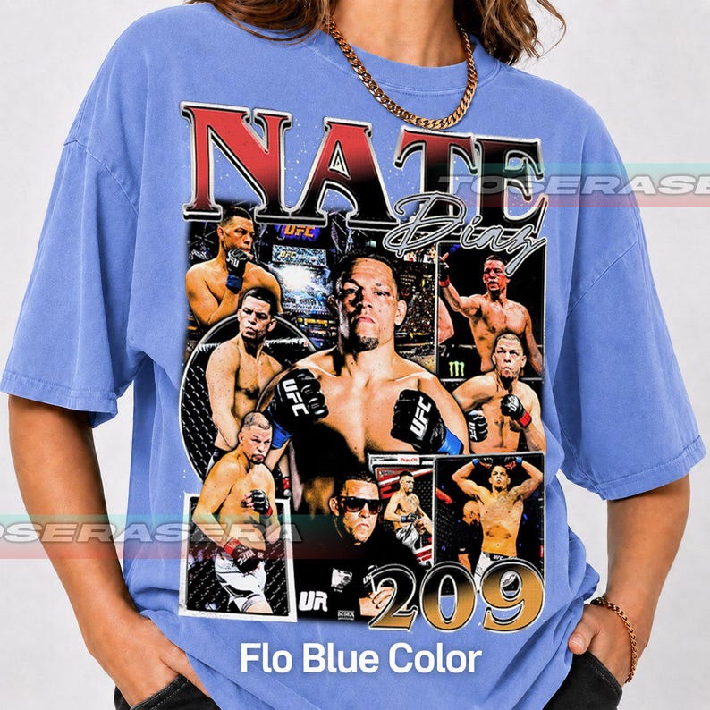 May include: A periwinkle blue t-shirt featuring a graphic collage of mixed martial artist Nate Diaz in various fighting poses. The text NATE DIAZ is printed in large bold letters at the top, with the number 209 displayed prominently at the bottom.