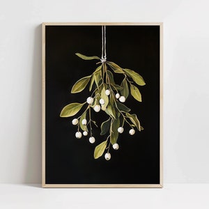 Printable mistletoe wall art with green leaves and white berries on a dark background, vintage rustic Christmas holiday print
