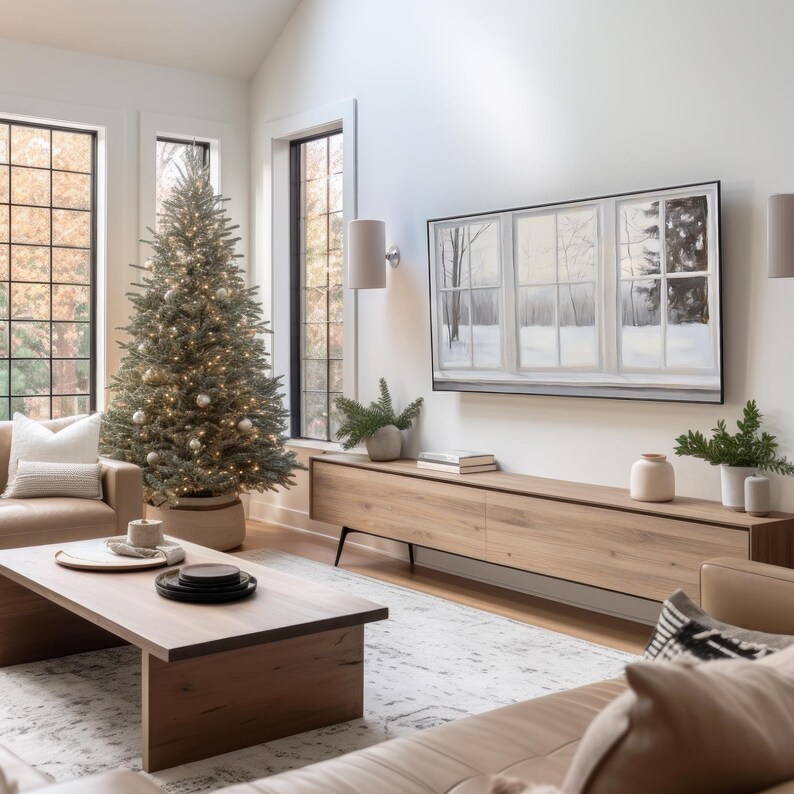Samsung Frame TV art depicting a realistic painted window view of a serene winter landscape. Soft light filters through frosted glass panes, revealing snow-covered trees and a peaceful gray-and-white forest scene outside. The brushstrokes create a cozy, minimalist atmosphere perfect for modern farmhouse or winter home décor.