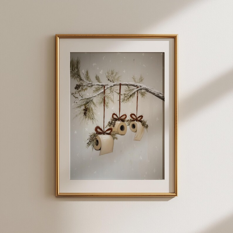 Funny Christmas bathroom print featuring toilet paper ornaments with red bows and greenery on a snowy pine branch, humorous holiday wall art digital download.
