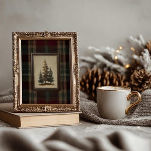 Vintage pine tree painting surrounded by a red, green, and gold tartan plaid border, rustic Christmas wall art for lodge or farmhouse holiday decor.