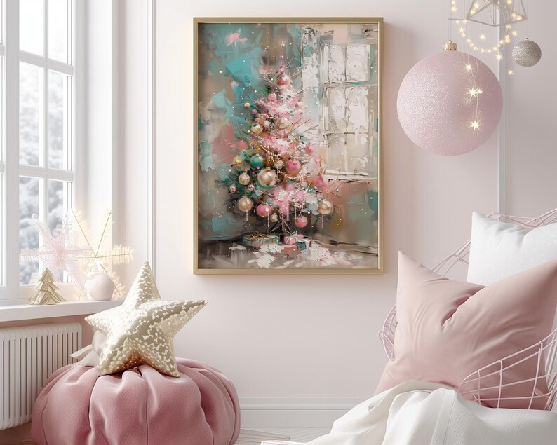 May include: A framed painting of a pink and green Christmas tree with ornaments, set against a light blue and white background. The painting is in a gold frame and is hanging on a white wall.